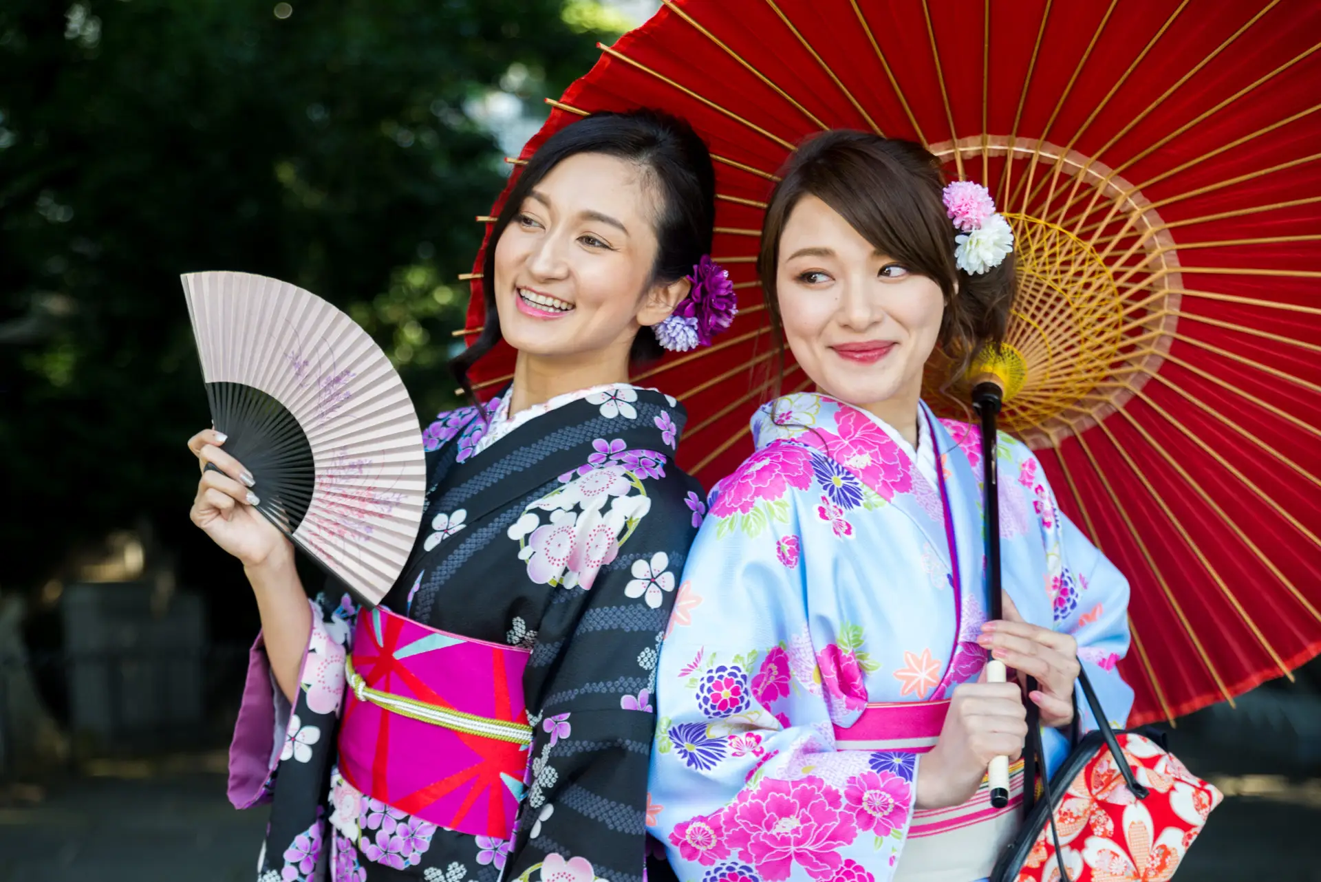 Two women in colorful kimonos.
