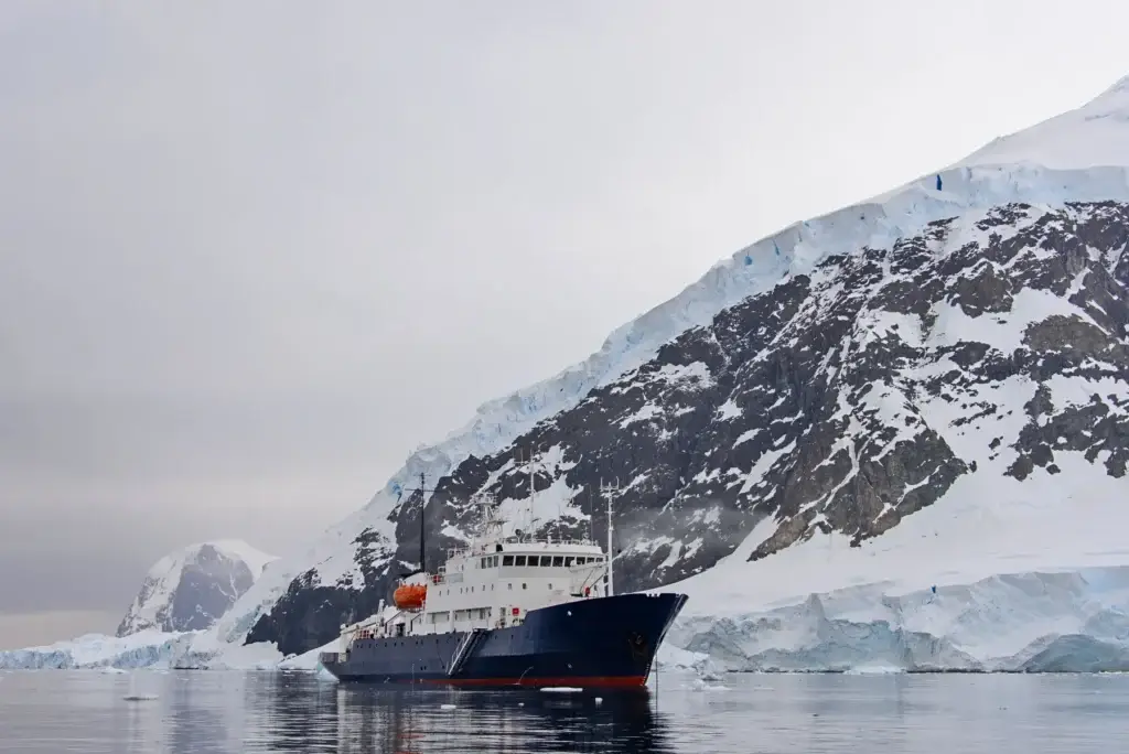 Expedition ship sailing in the Antarctic sea