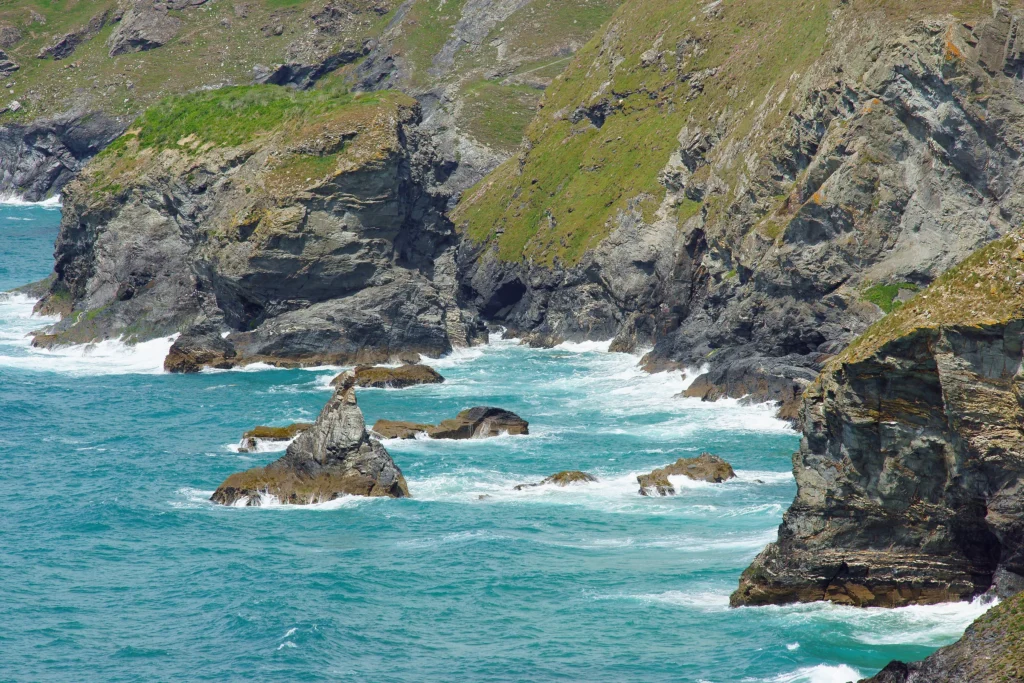 Sea stacks and blue water at Bedruthan Steps on the Cornish coast