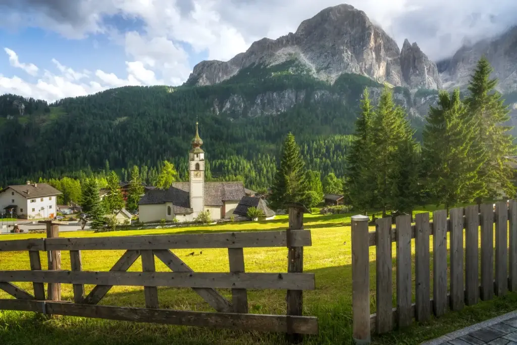 Church and village landscape at Colfosco in Alta Badia