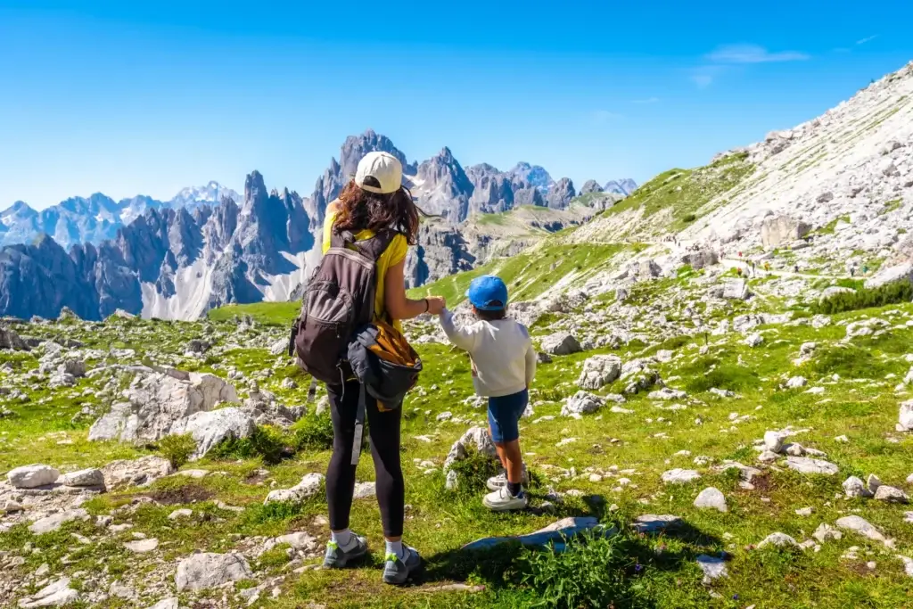 Tourists hiking on the tre cime di lavaredo trail in the italian dolomites