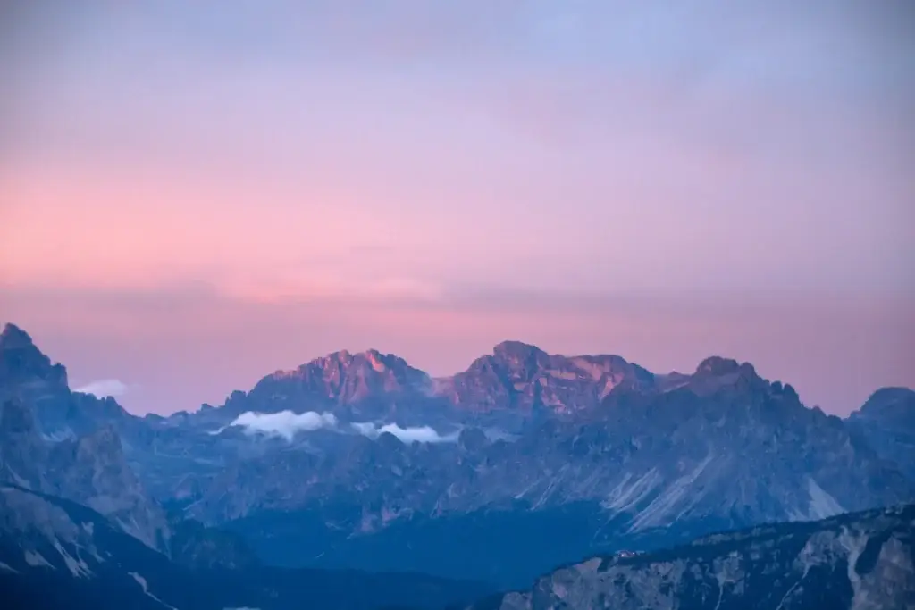 Pink Sky Over Mountain Range During Golden Hour
