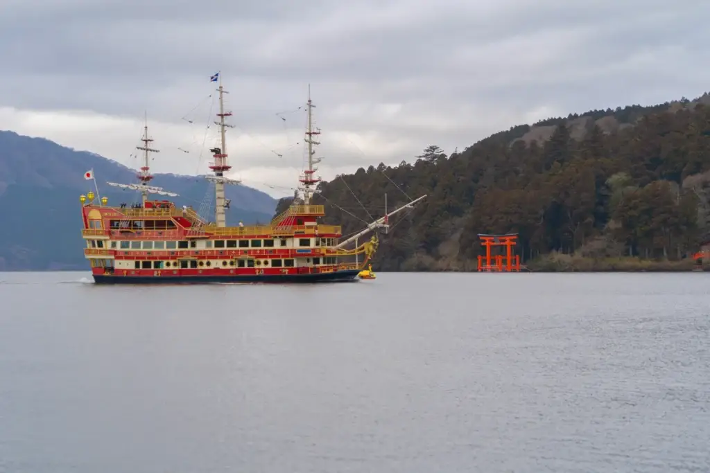 Lake Ashi sightseeing boat and lakeside torii in Hakone