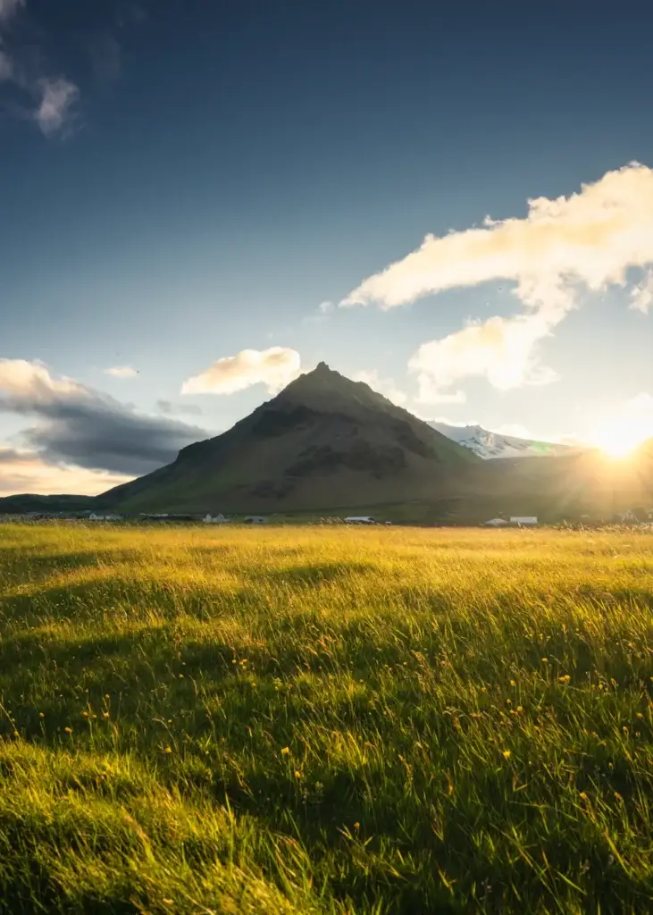 Stapafell mountain and meadow in long summer light near Arnarstapi
