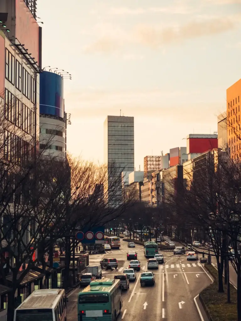 Tokyo avenue and modern buildings in warm late-day light