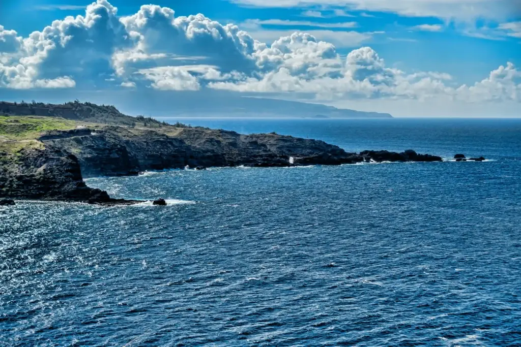 Open blue water and rugged volcanic coast on Maui