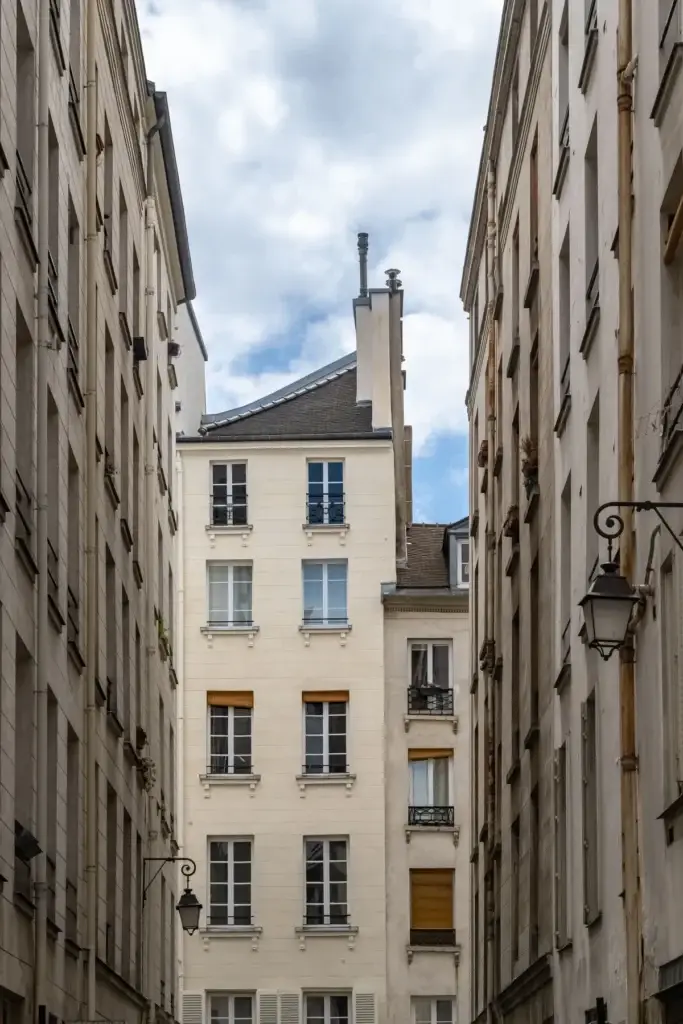 Historic building and quiet street in the Marais district of Paris