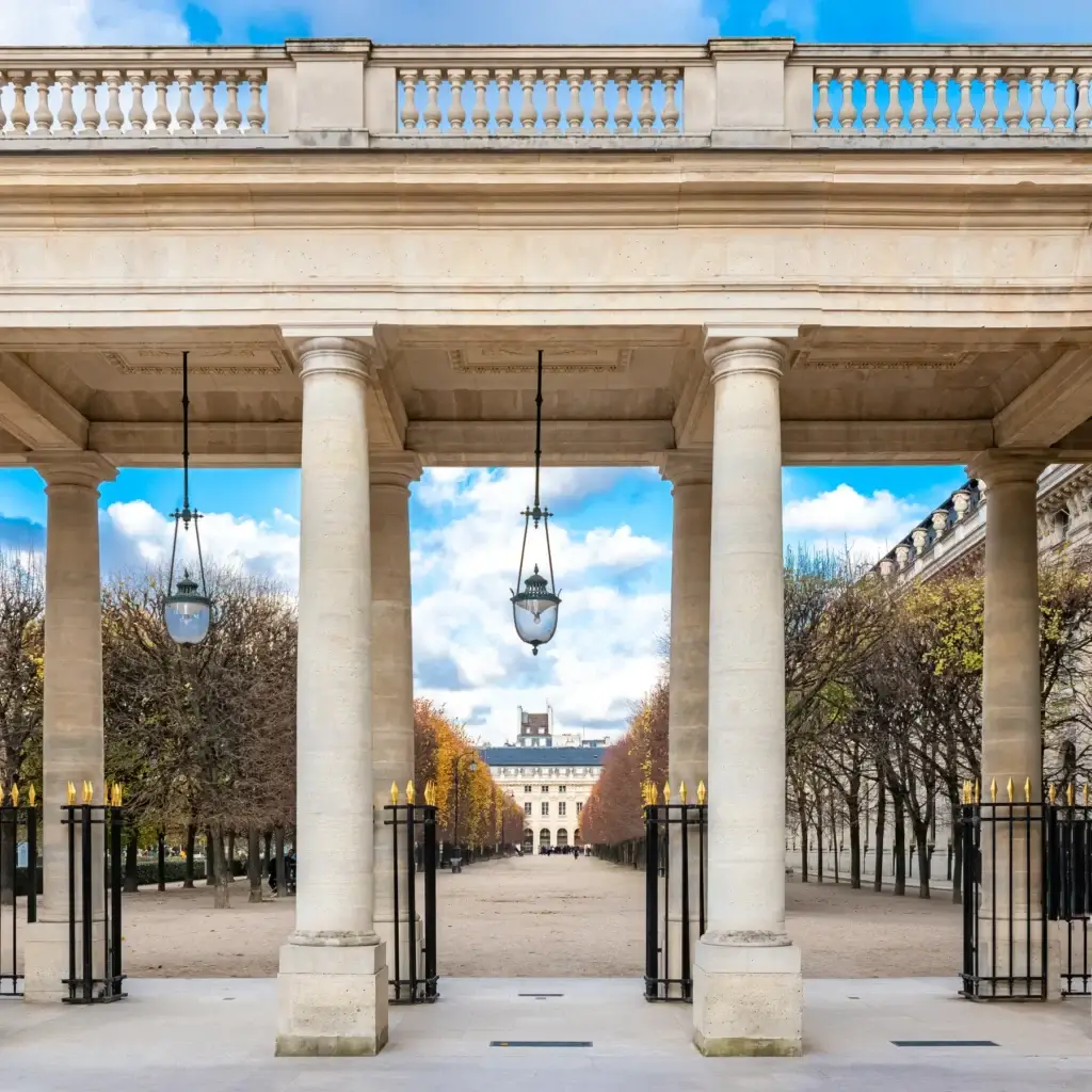 Palais-Royal colonnade and tree-lined architectural axis in Paris