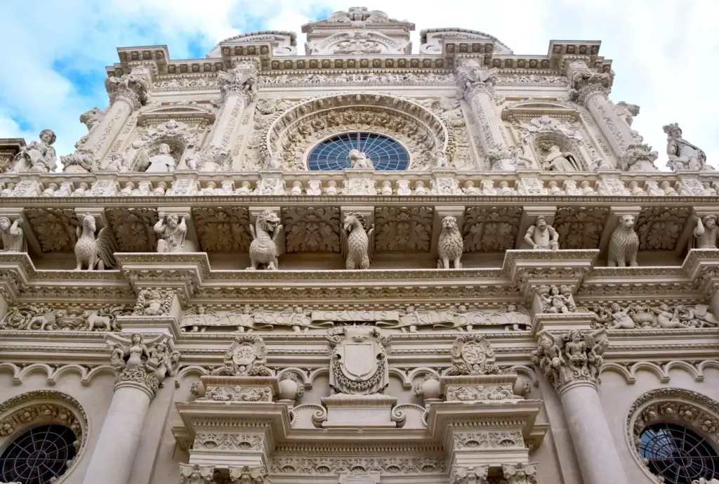 Ornate Baroque church facade and carved stonework in Lecce, Puglia