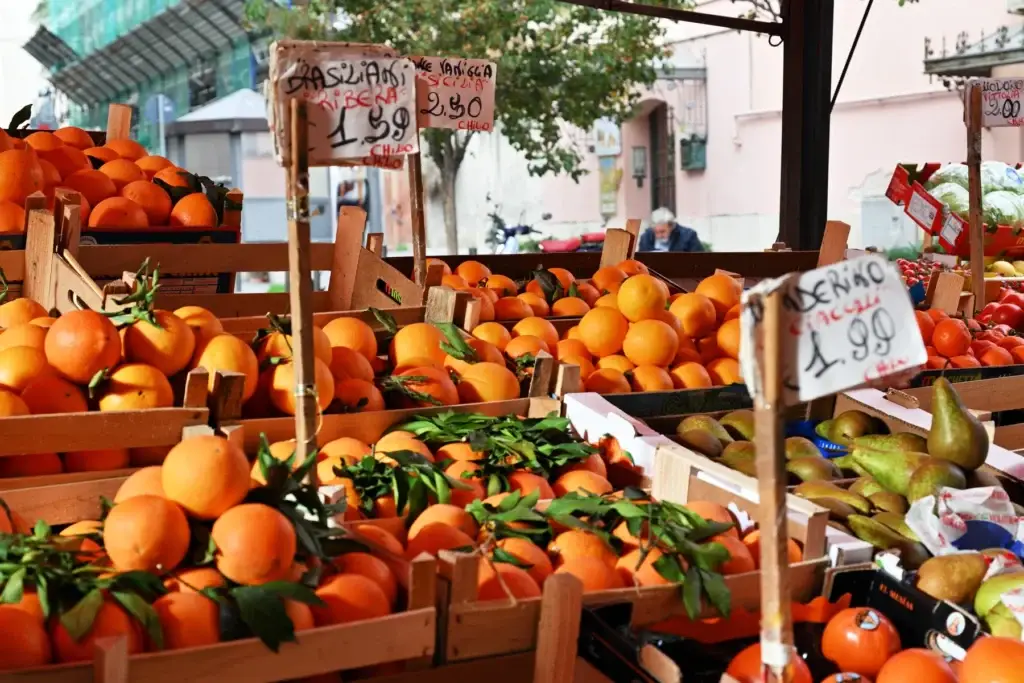 Citrus and produce stalls at Ballaro Market in Palermo