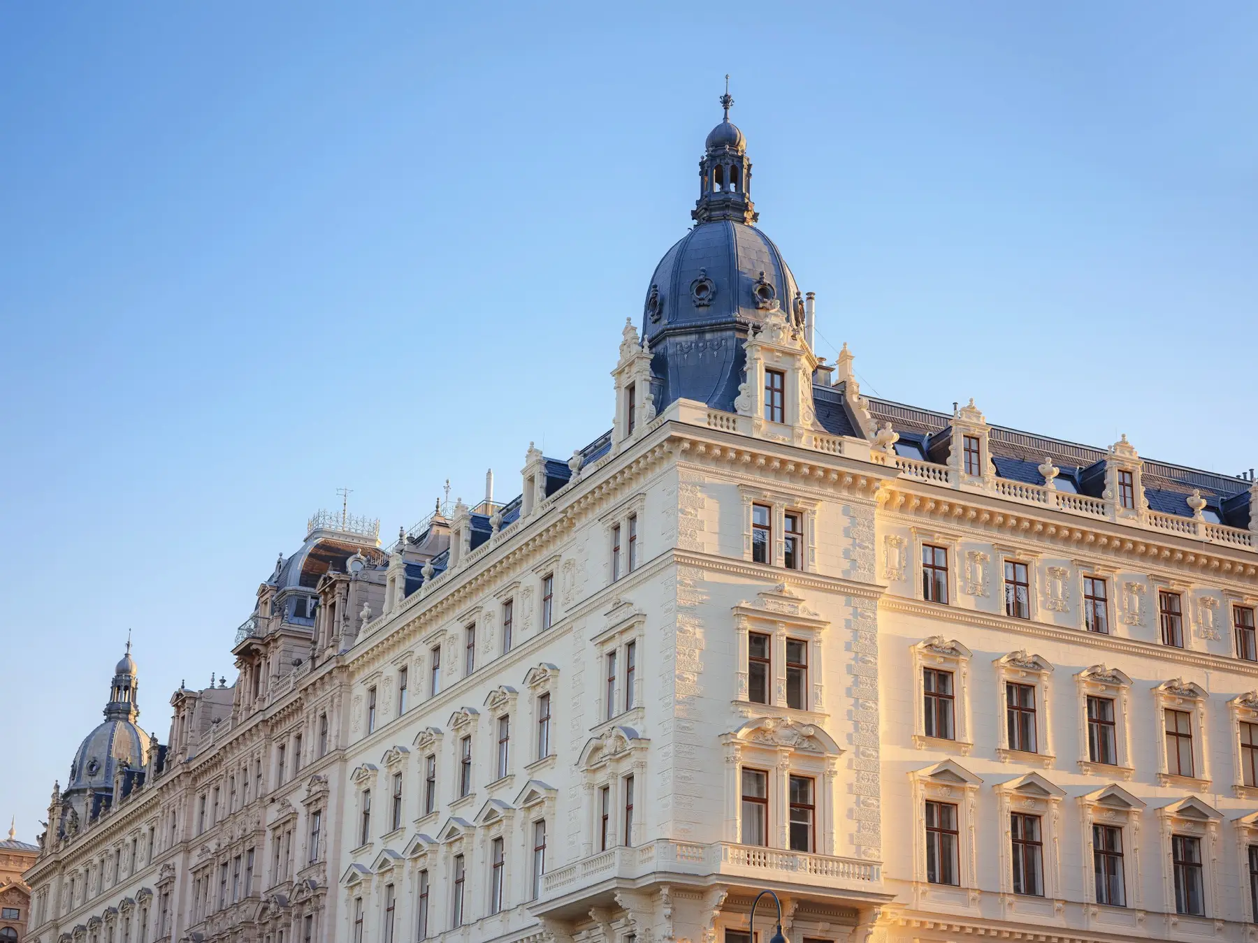 Historic European architecture representing iconic luxury hotels