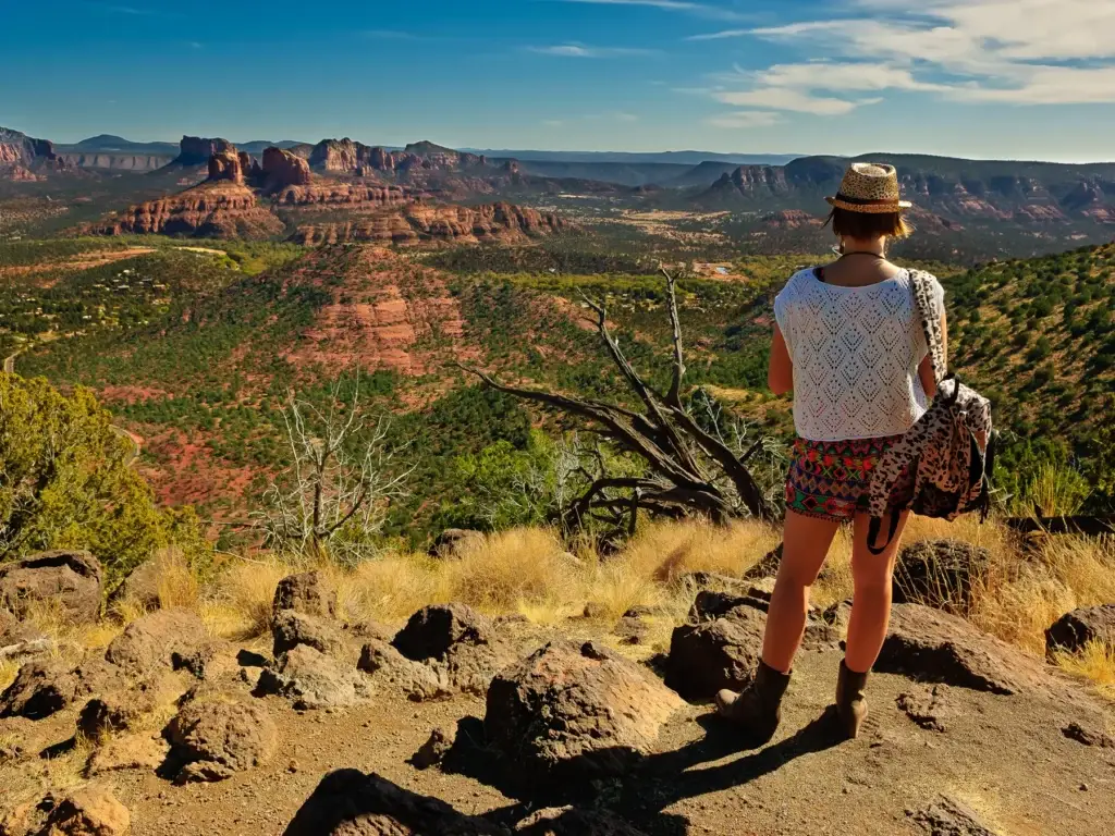 Hiker overlooking a Sedona red-rock landscape