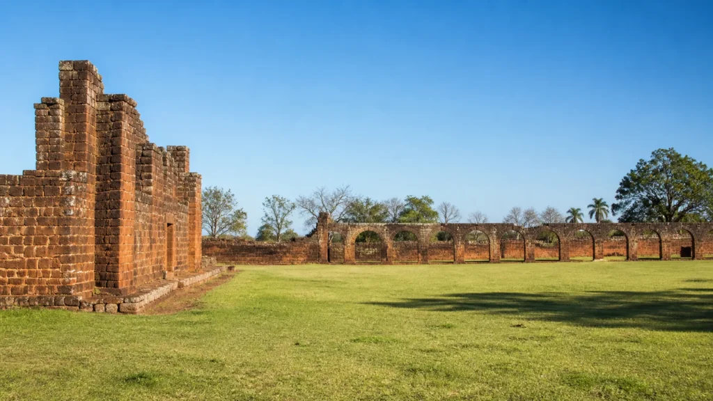 AI-generated editorial visualization of a generalized landscape context for Paraguay's Jesuit mission ruins.