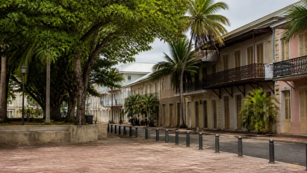 AI-generated editorial visualization of an anonymous historic public-space context in Cayenne.
