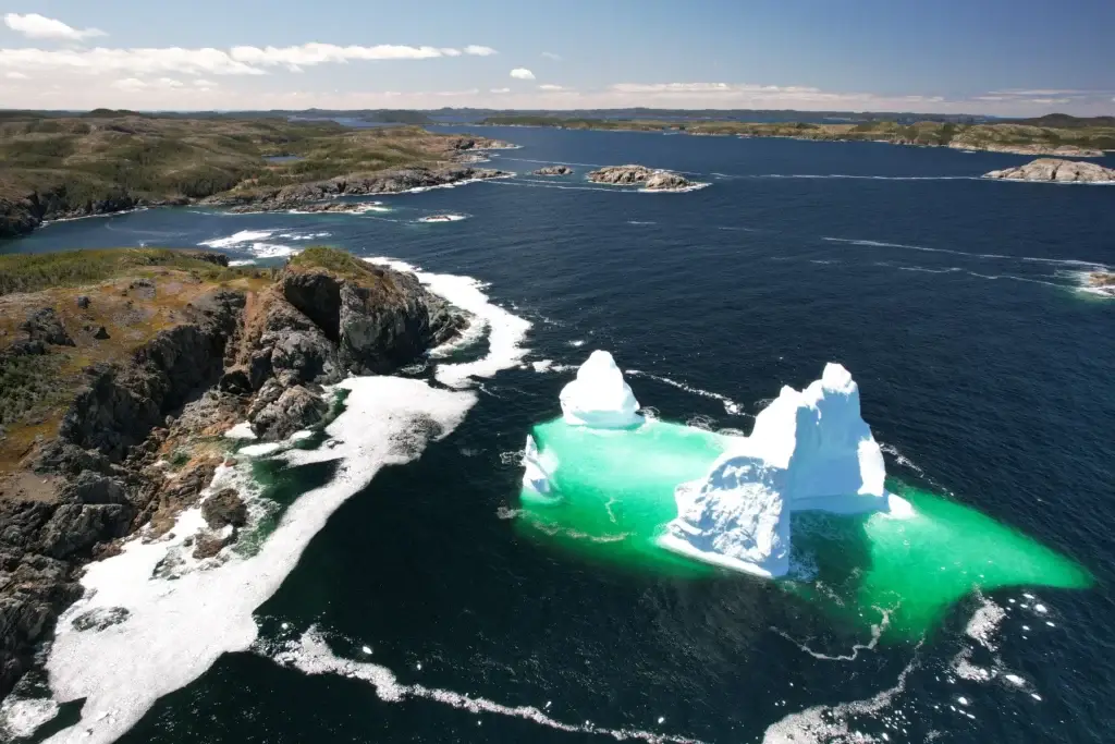 Documented iceberg or whale sighting from Fogo Island or Change Islands, preferably from a safe shore viewpoint