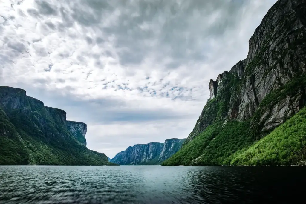 Documented Western Brook Pond, its public approach trail or authorized public boat