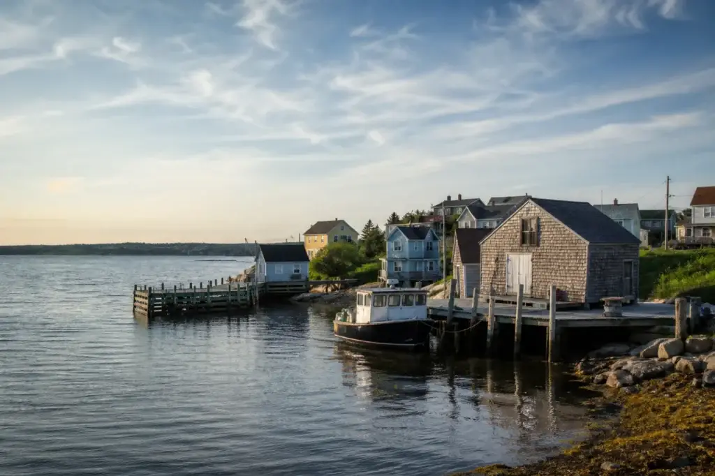 Wide Halifax Harbour view with working-waterfront context, or a documented South Shore coastal composition that can carry the full destination title
