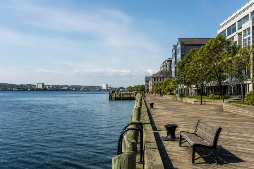 Halifax waterfront boardwalk, central harbour or downtown harbour edge with recognizable Halifax context