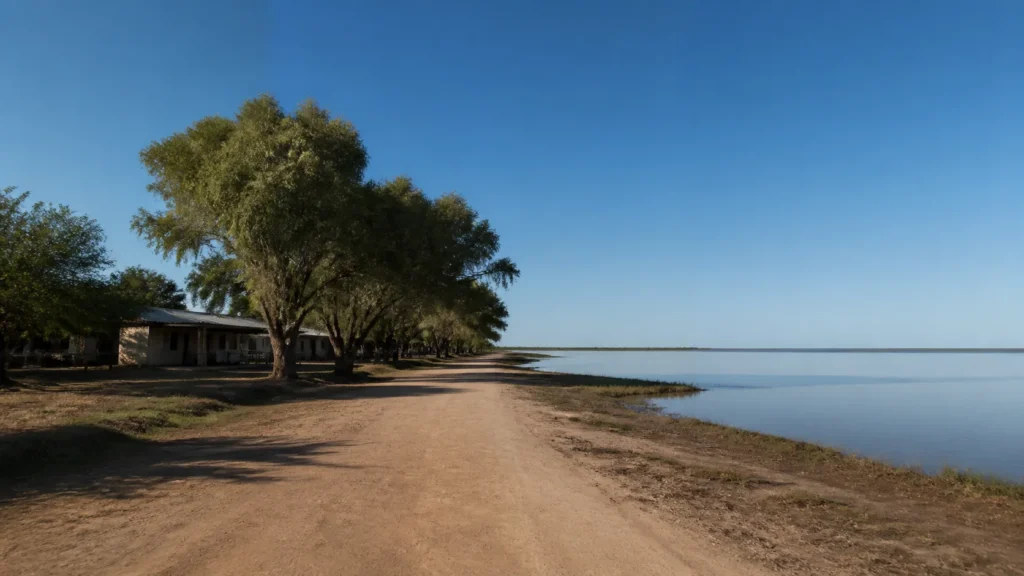 AI-generated editorial visualization of a property-neutral village-and-water context near Laguna Ibera.