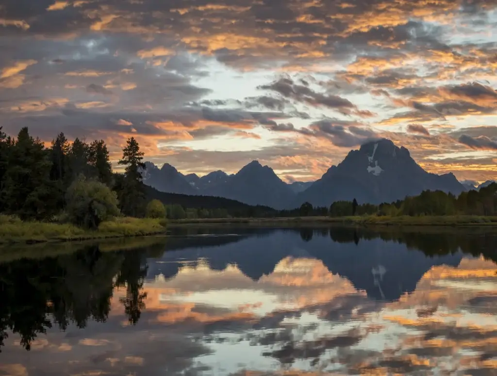 Grand Teton National Park at dawn, ideally Teton Range from Snake River, Oxbow Bend, Schwabacher Landing, Mormon Row or Jackson Lake context