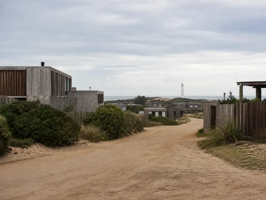 AI-generated editorial visualization of José Ignacio lighthouse and village context.