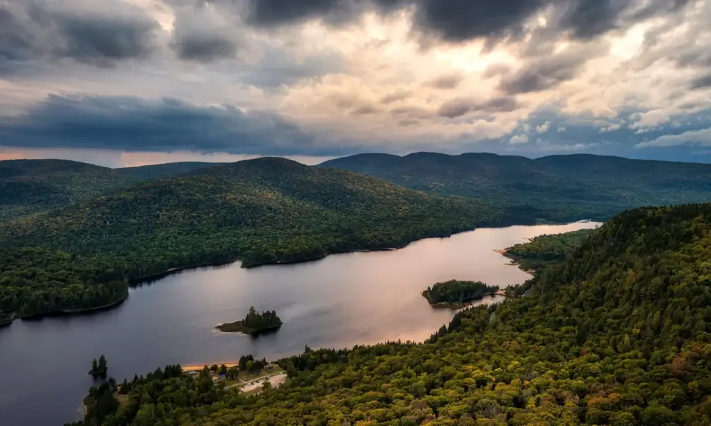 Wide Mont-Tremblant and Lac Tremblant landscape, or an exact Laurentian mountain-and-lake view within the guide boundary
