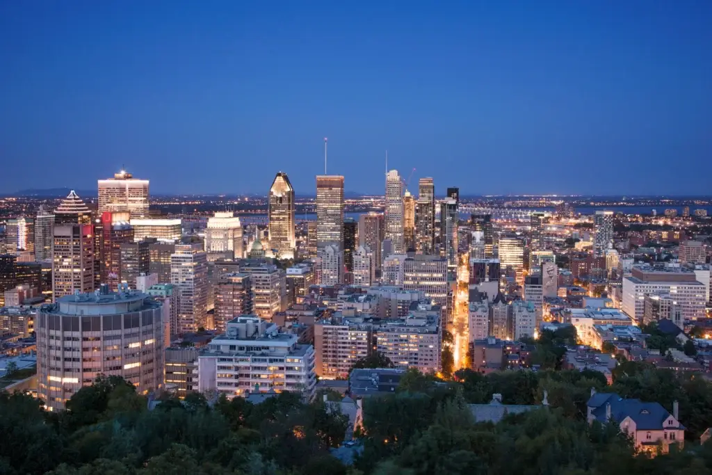 Montréal skyline with Mount Royal, downtown and St. Lawrence River or Old Port context clearly identifiable