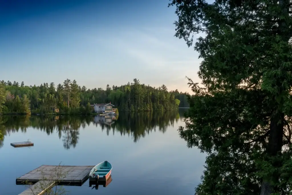 Documented Muskoka Lakes or southern Georgian Bay shoreline with granite, pines and open water
