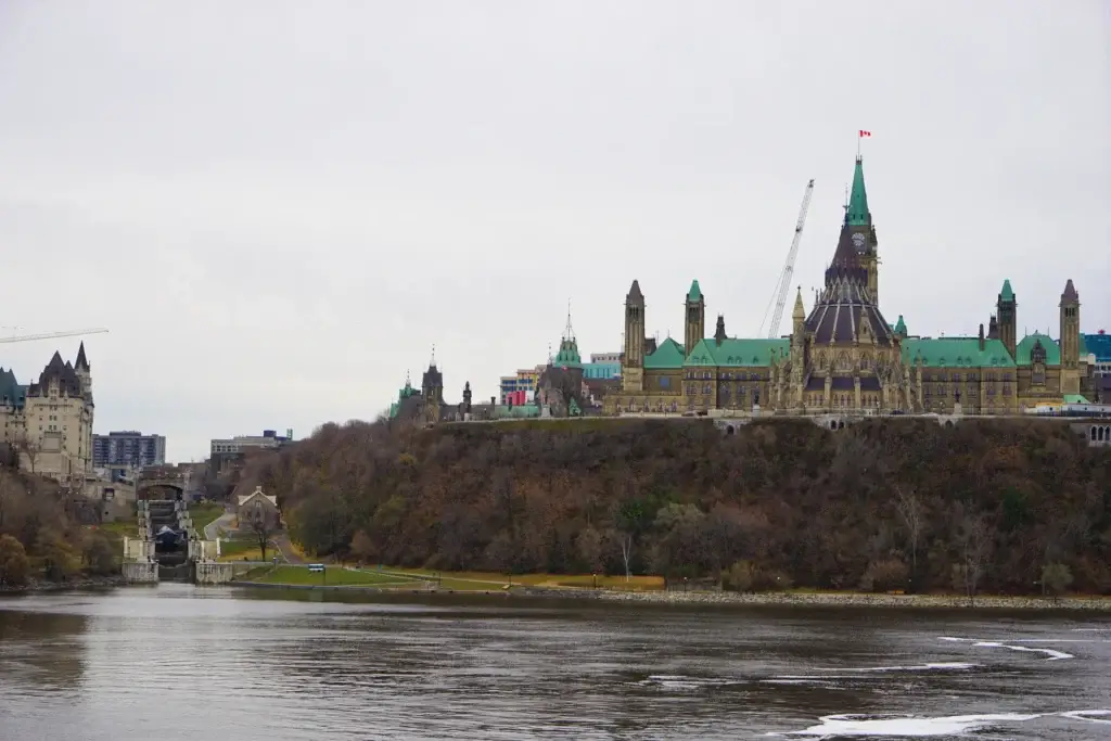 Ottawa skyline with Parliament Hill and visible Ottawa River or Rideau Canal context