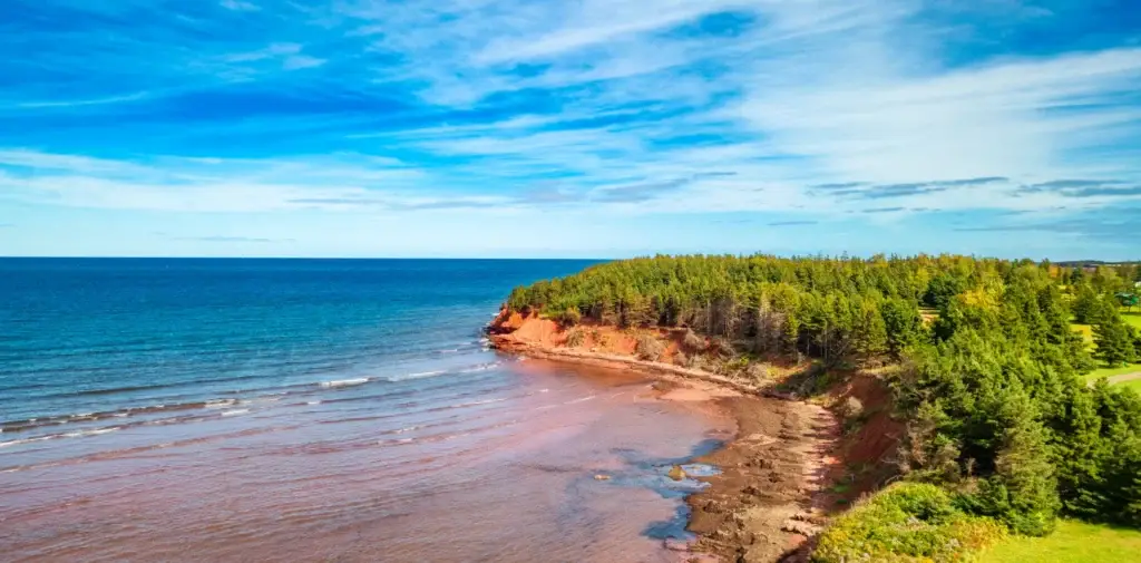 Documented Prince Edward Island coast with red sandstone, dunes or working harbour context