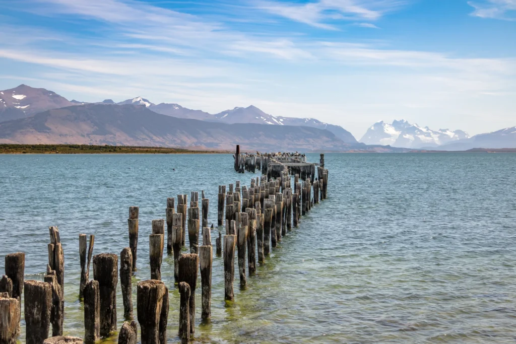 Exact Puerto Natales municipal museum exterior, historic working waterfront or documented town heritage setting