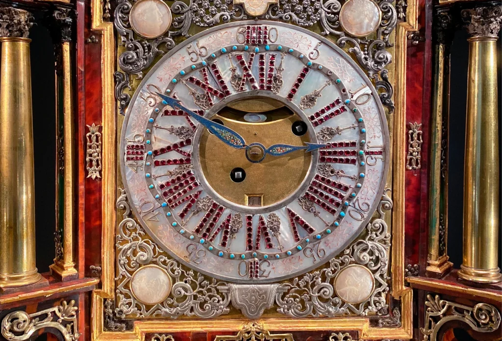 Ornate clock detail photographed at the Victoria and Albert Museum.