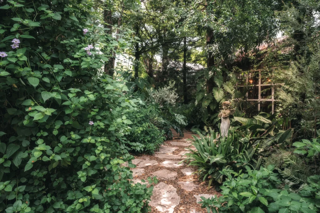 Illustrative garden path, not a photograph of Armadale Castle or its gardens.