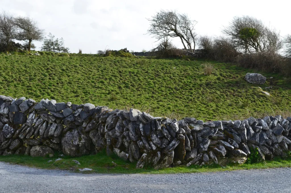 A stone wall in Ireland, shown as illustrative stonework rather than Gallarus Oratory.