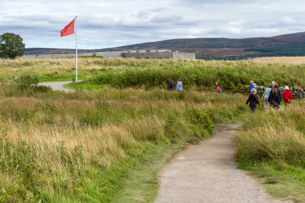 Visitors on a path at Culloden Battlefield.