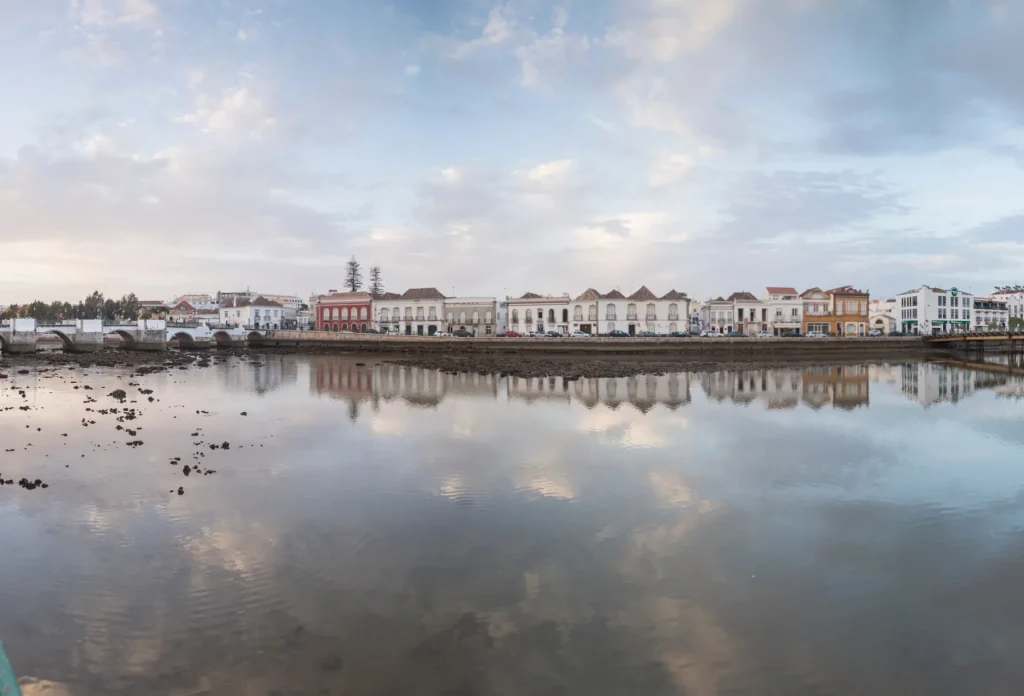 The Gilão River and riverside buildings in Tavira.