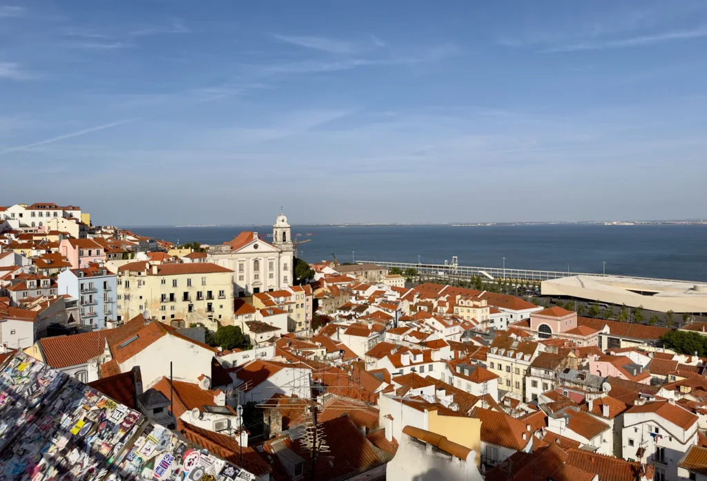 Houses in Lisbon's Alfama district; neighborhood context for the fado visit.