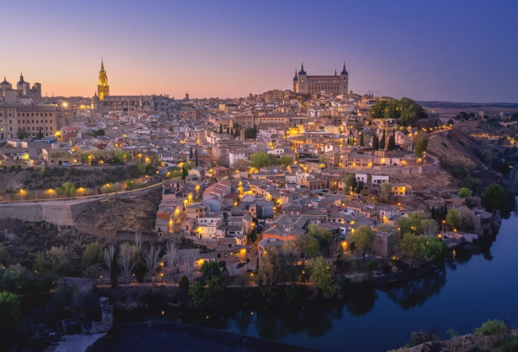 Toledo skyline at sunset, context for an overnight stay.