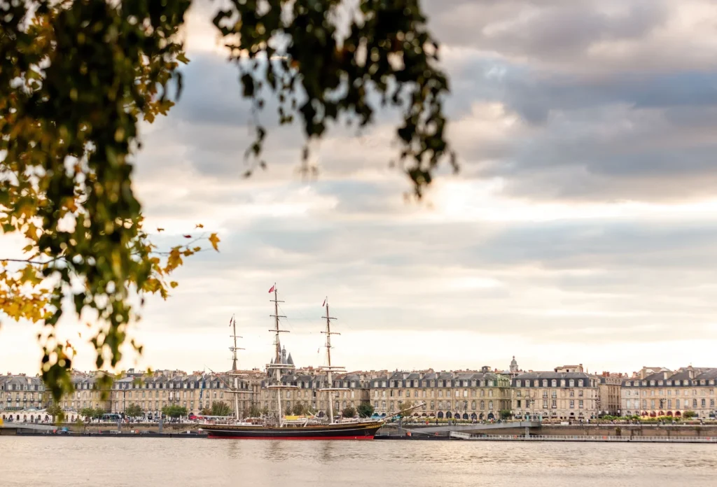 A moored sailing ship on the Bordeaux waterfront, providing city context for the history explored at the Musée d’Aquitaine. The museum is not pictured.