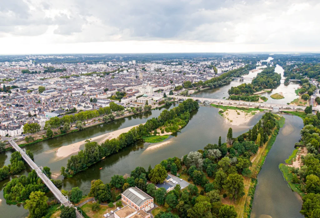 Tours and the bridges across the Loire, providing city context for the old-town afternoon; this is not a street-level view.