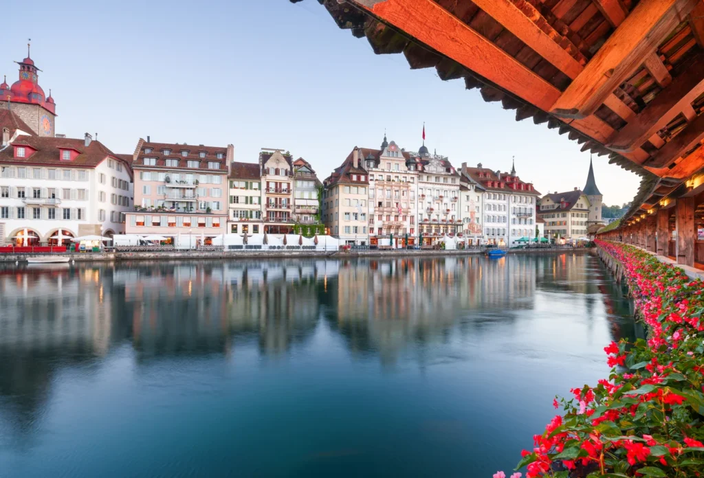 Lucerne beside the Reuss in the morning, illustrating a city base.