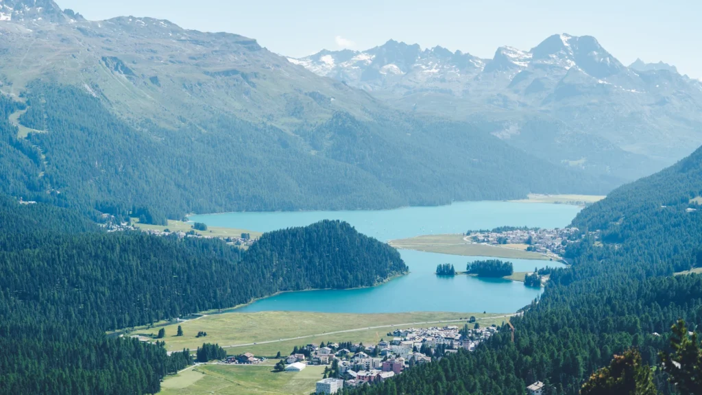 The Upper Engadin lake landscape in summer. No particular town or lake frontage is identified.