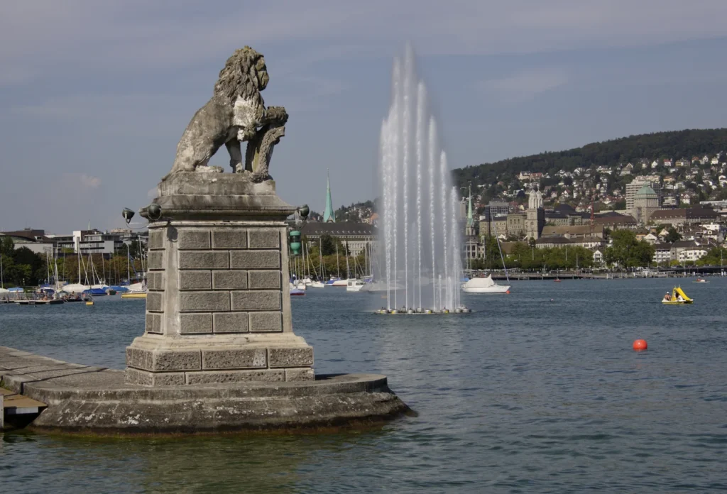Lion sculpture and fountain at Lake Zürich, providing public-art context for a cultural stay. The Kunsthaus is not pictured.