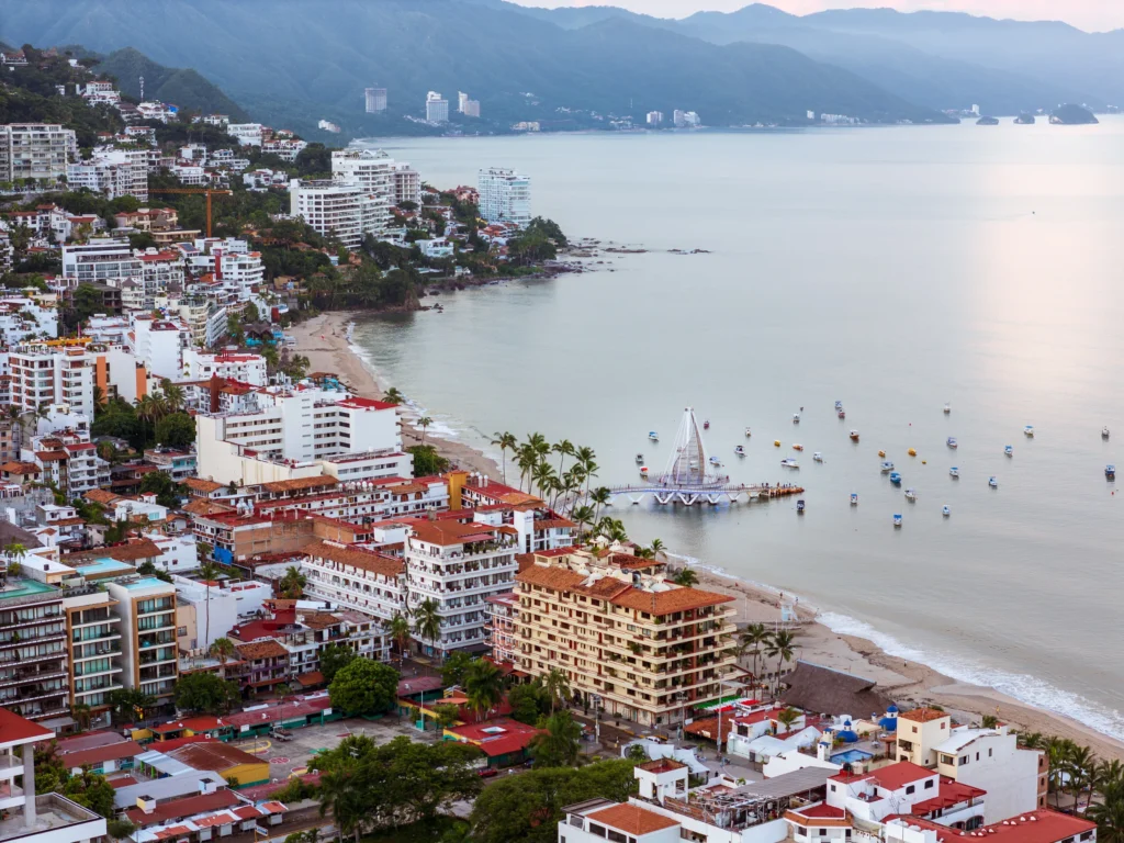 Drone view of Los Muertos beach and pier in Puerto Vallarta Mexico