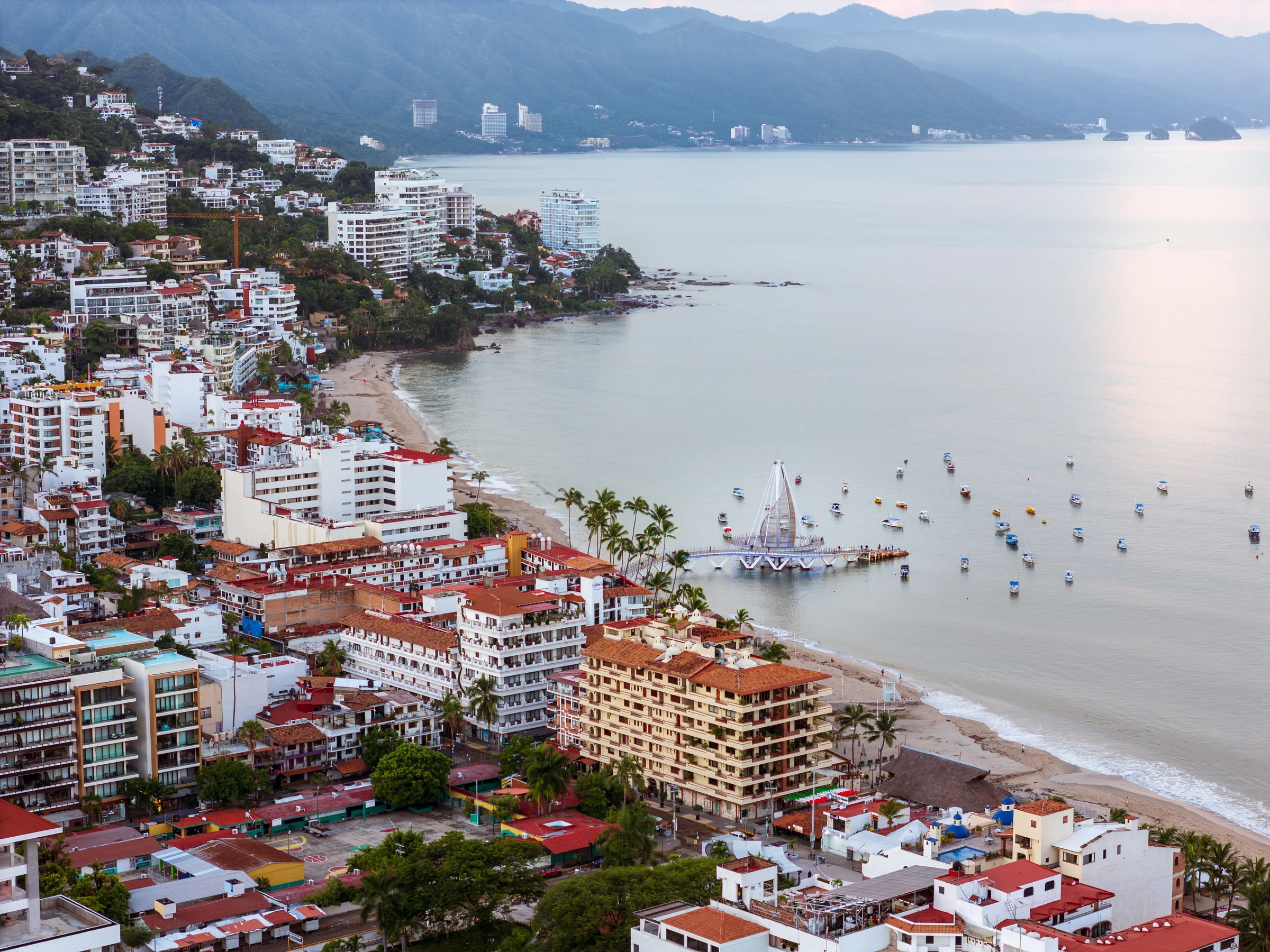 Drone view of Los Muertos beach and pier in Puerto Vallarta Mexico