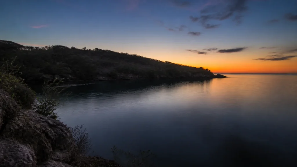 AI-generated editorial visualization of Move from refuge light to a protected dark-water night.