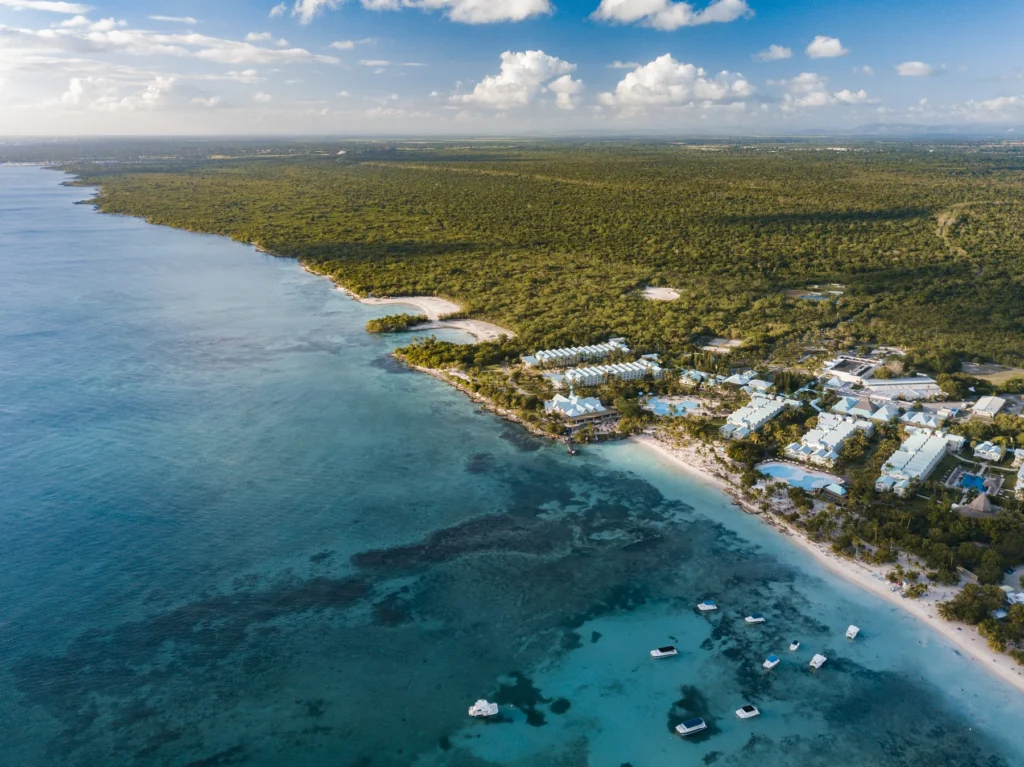 Landscape of the Bayahibe Beach surrounded by the sea and greenery in the Dominican Republic