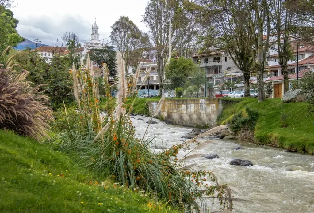 The Tomebamba River and Todos los Santos church tower, Cuenca.