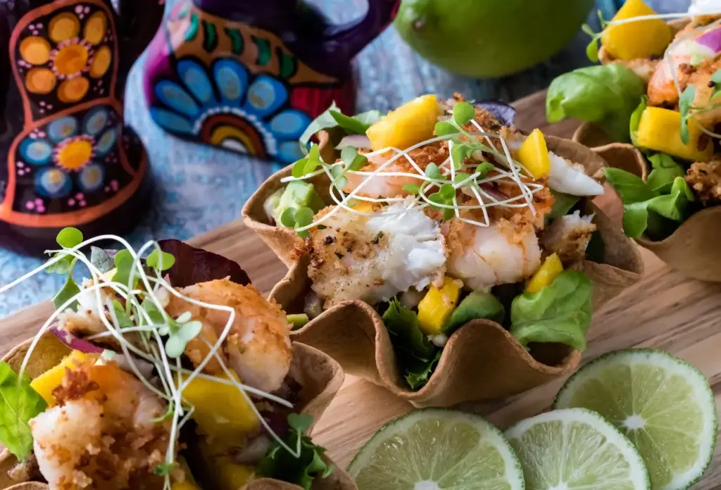 Tacos with shrimp and mango; illustrative dish detail.