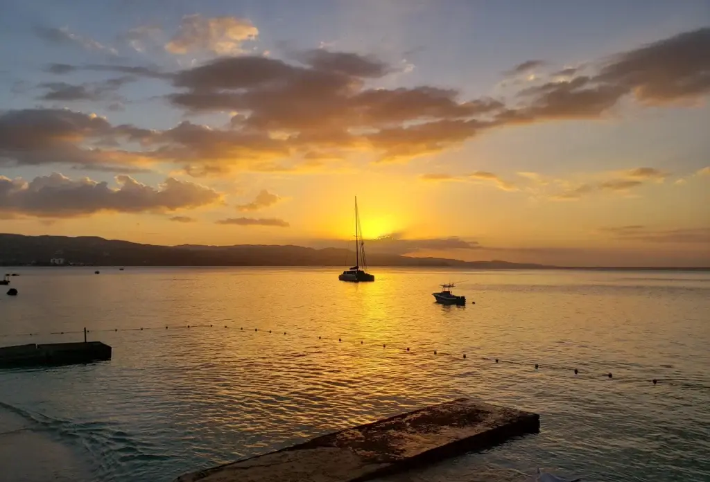 Coastal light and anchored boats in Montego Bay, Jamaica.